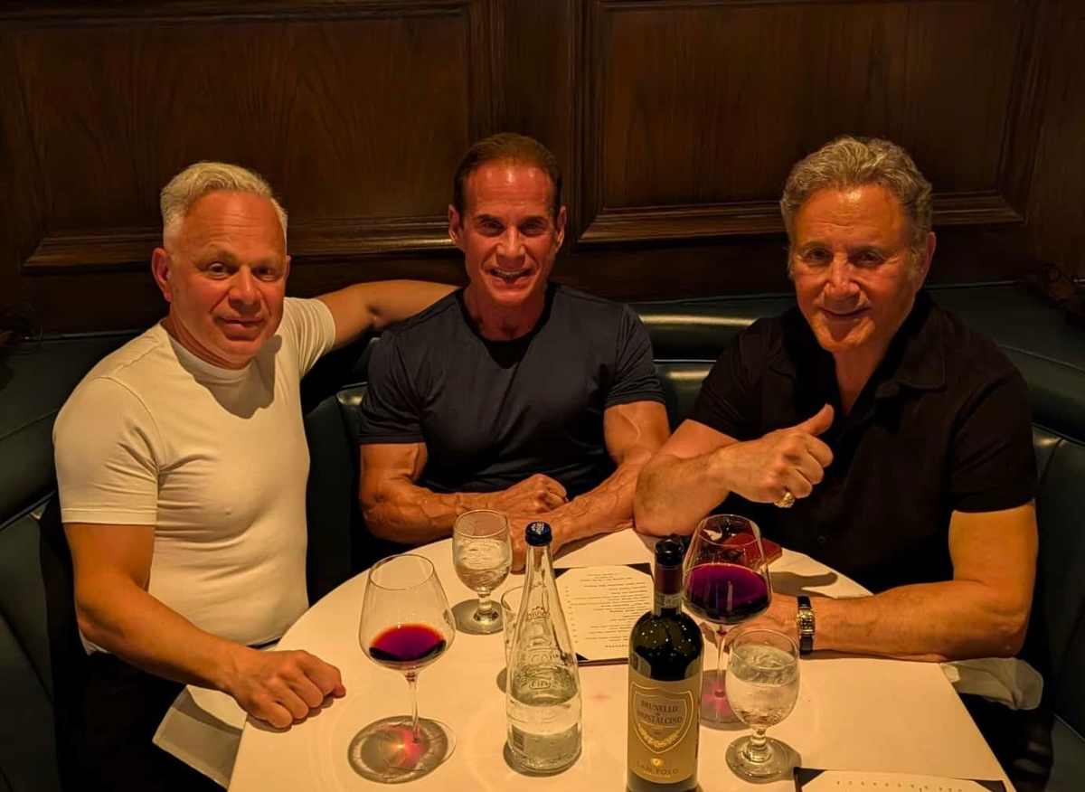 Mike Torchia at dinner with two longtime friends